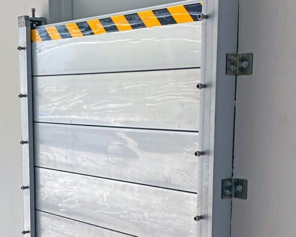 Detailed view of aluminum stop-log flood panel with vertical mounting post and seal system